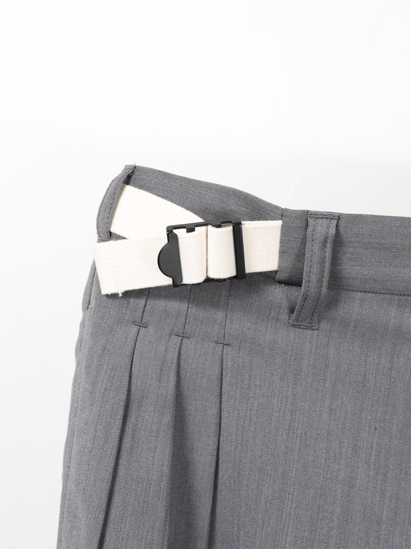 ANCELLM BELTED WOOL SLACKS – KIKUNOBU