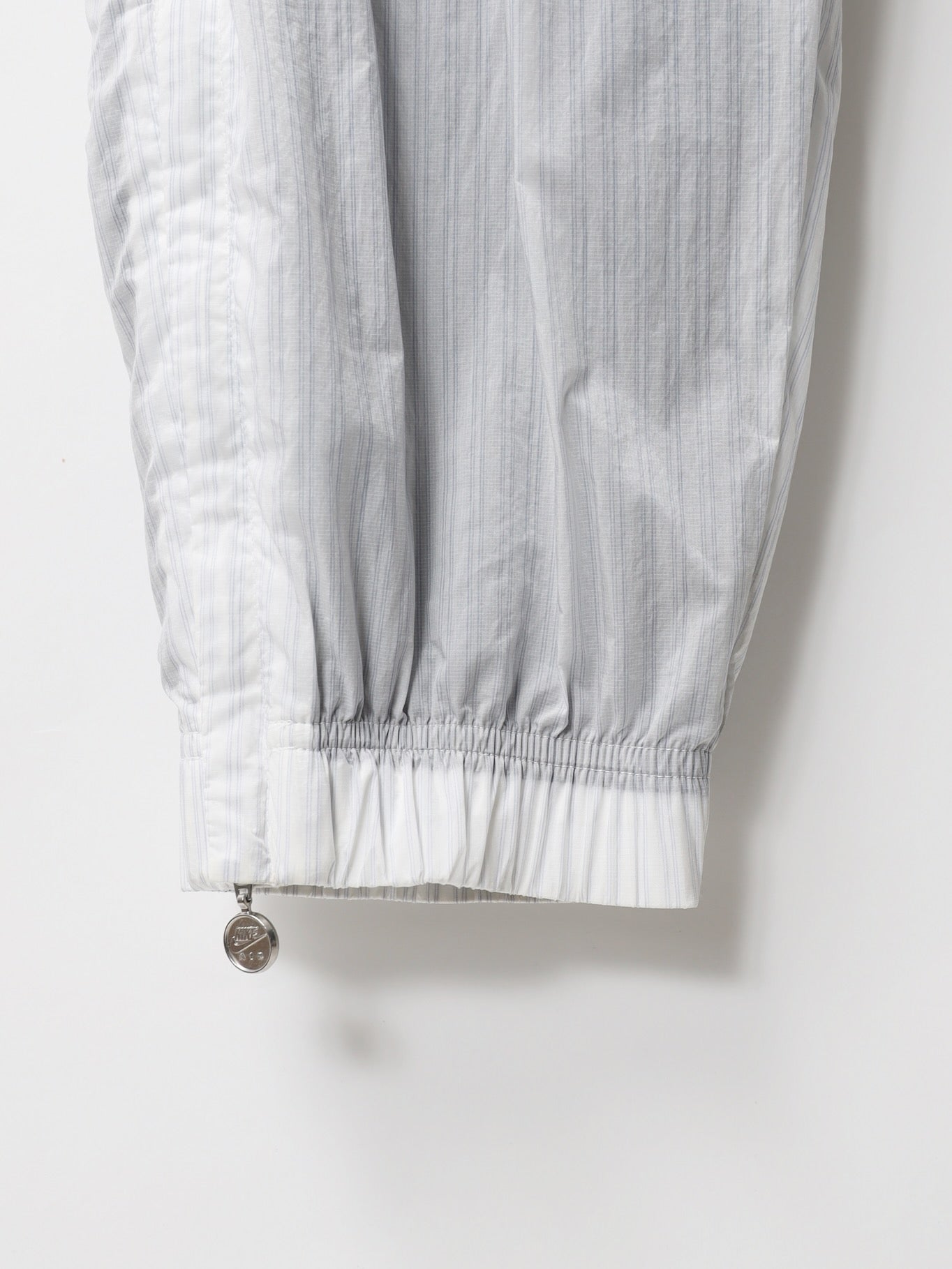 NIKE　STRIPE TRACK PANTS