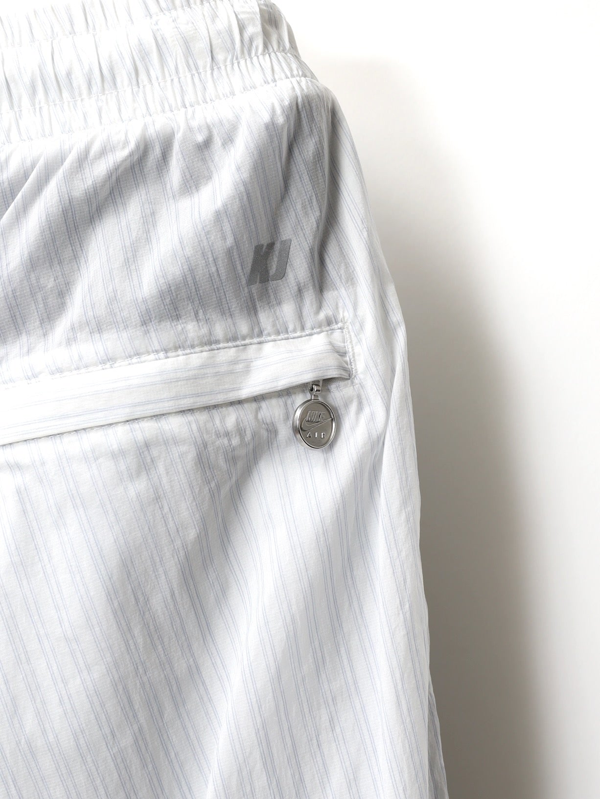 NIKE　STRIPE TRACK PANTS