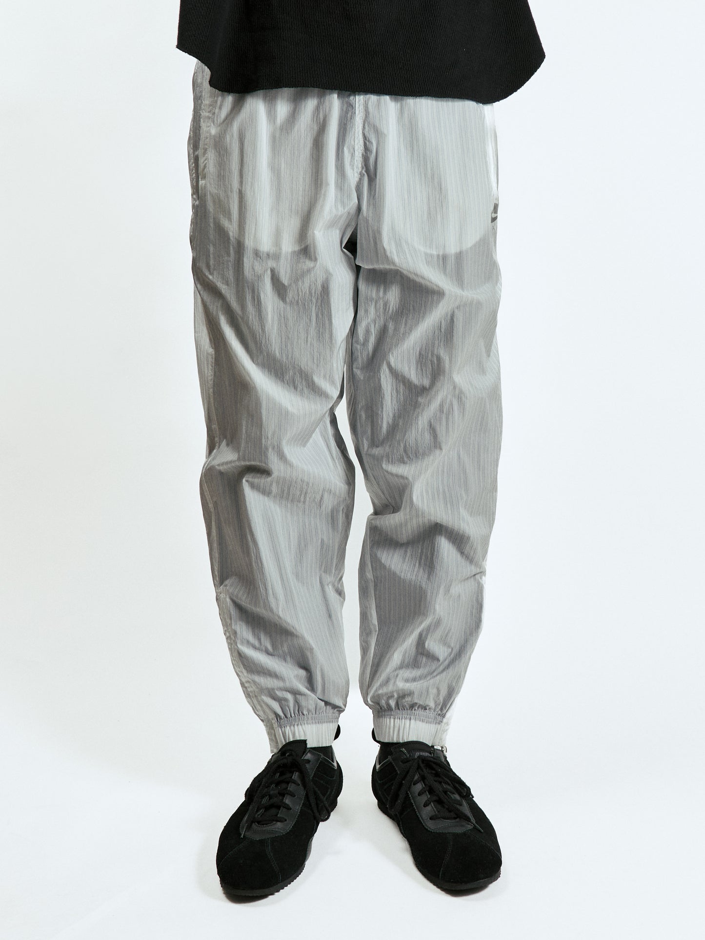 NIKE　STRIPE TRACK PANTS
